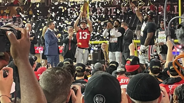 2023-0109-CFPtitlegame-Stetson Bennett Trophy