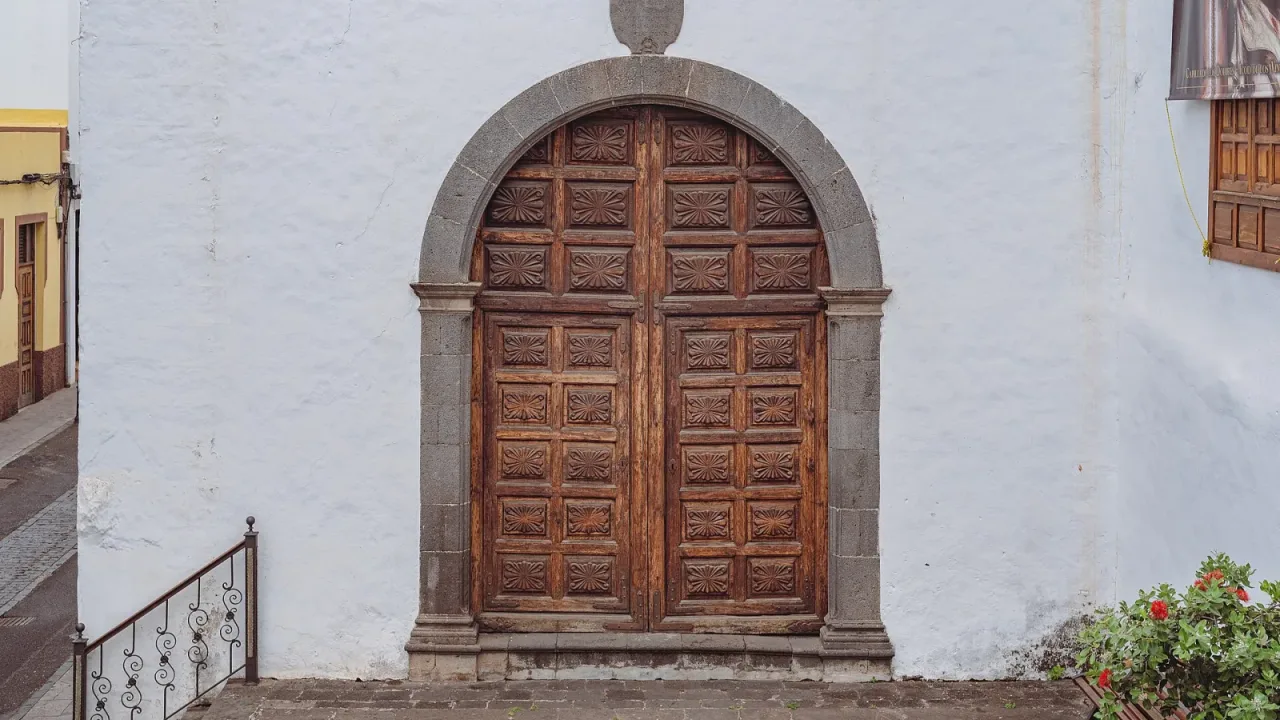 A tall wooden door of the Ex-convento de San Francisco in Icod de los Vinos, Tenerife, Spain.