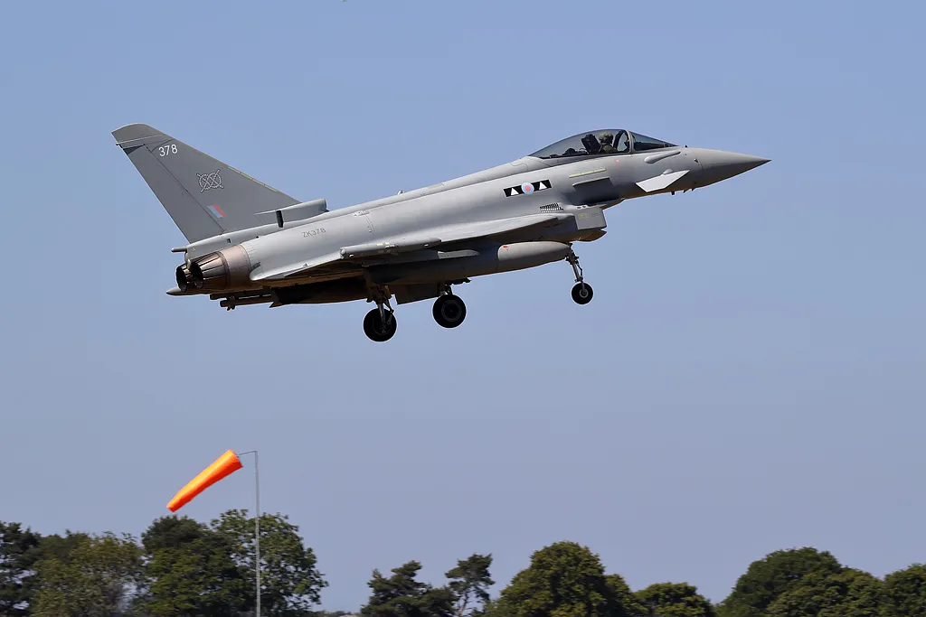 A Typhoon at RAF Lossiemouth. This 2 Squadron Typhoon military jet is on the approach to Runway 05 at the RAF base.