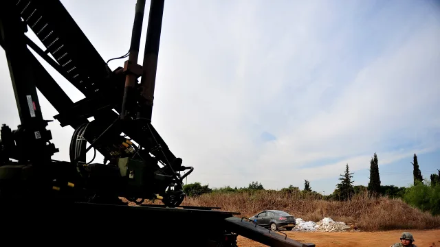 A U.S. Soldier with Bravo Battery, 5th Battalion, 7th Air Defense Artillery Regiment ensures launch pads are in the correct…