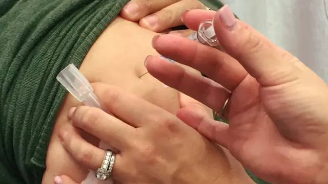 A woman receives the seasonal influenza vaccine (flu shot). Credit: NIAID