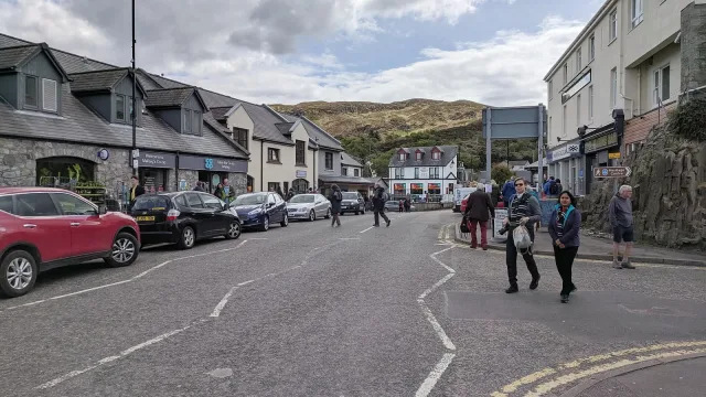 The A830 road as it passes through the city center of Mallaig, Scotland.