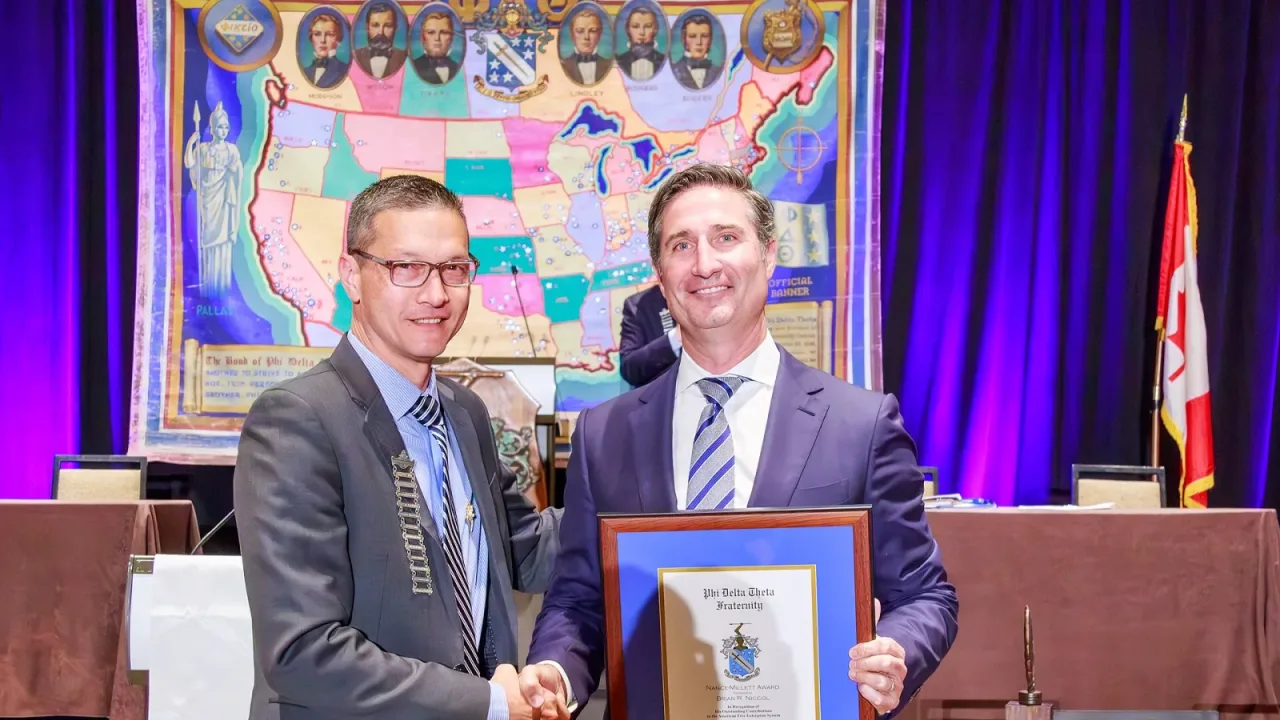 Brian Niccol (right)