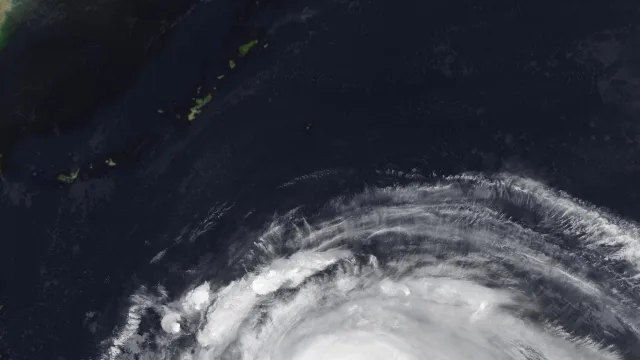 Super Typhoon Champi as a powerful Category 5-equivalent typhoon on October 20, 2026.
