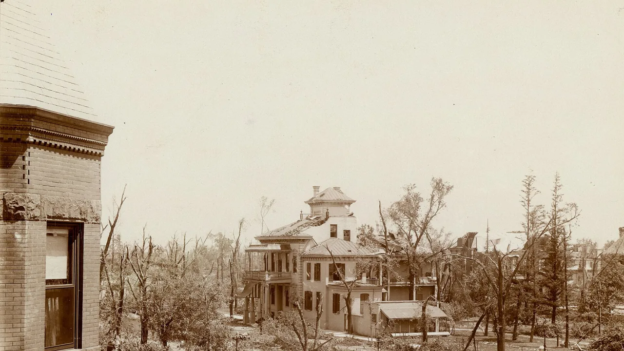 Title: Damage to house and trees from tornado of 1896.