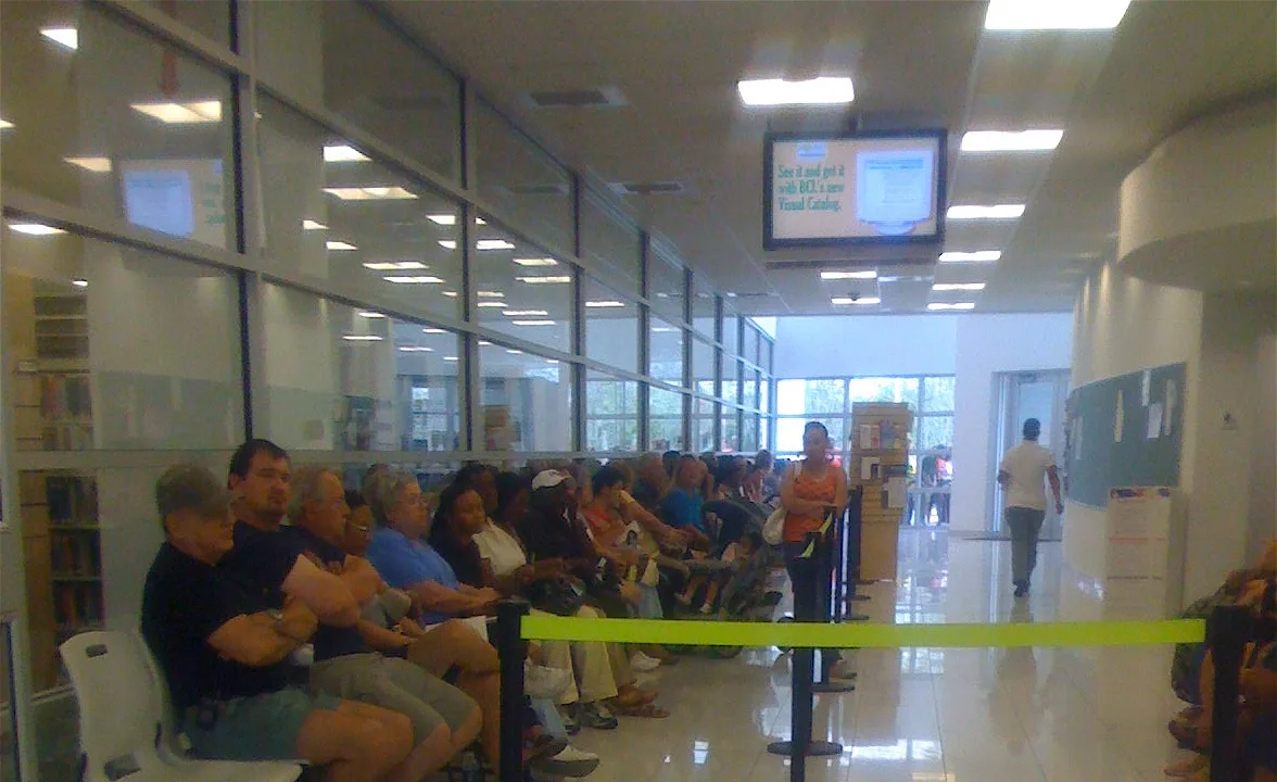 Early voters seated inside the polling place waiting