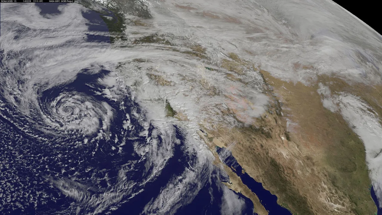 A swirling Eastern Pacific Ocean storm system headed for California was spotted by NOAA's GOES-West satellite on February 28.