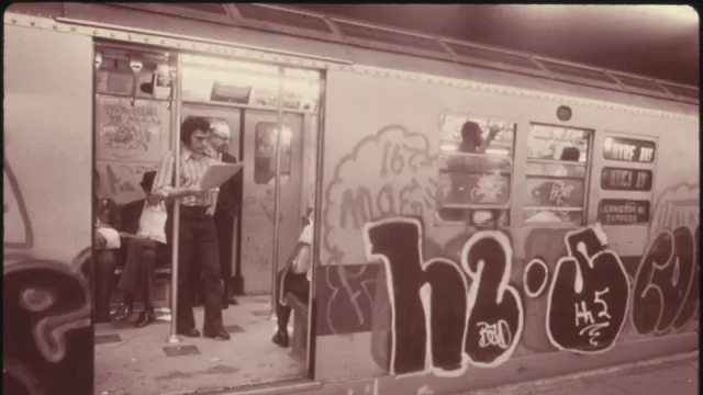 GRAFFITI ON A SUBWAY CAR ON THE LEXINGTON AVENUE LINE IN NEW YORK CITY. IN 1973 TRANSIT AUTHORITY POLICE ARRESTED MORE THAN…