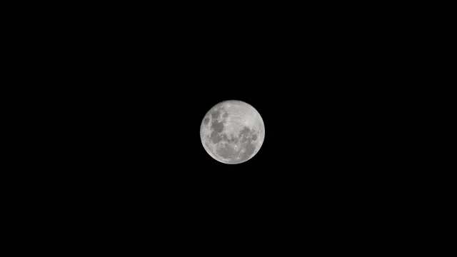 Iss072e097437 (Oct 18, 2024) -- October's full moon, known as "The Hunter's Moon," is pictured from the International Space…