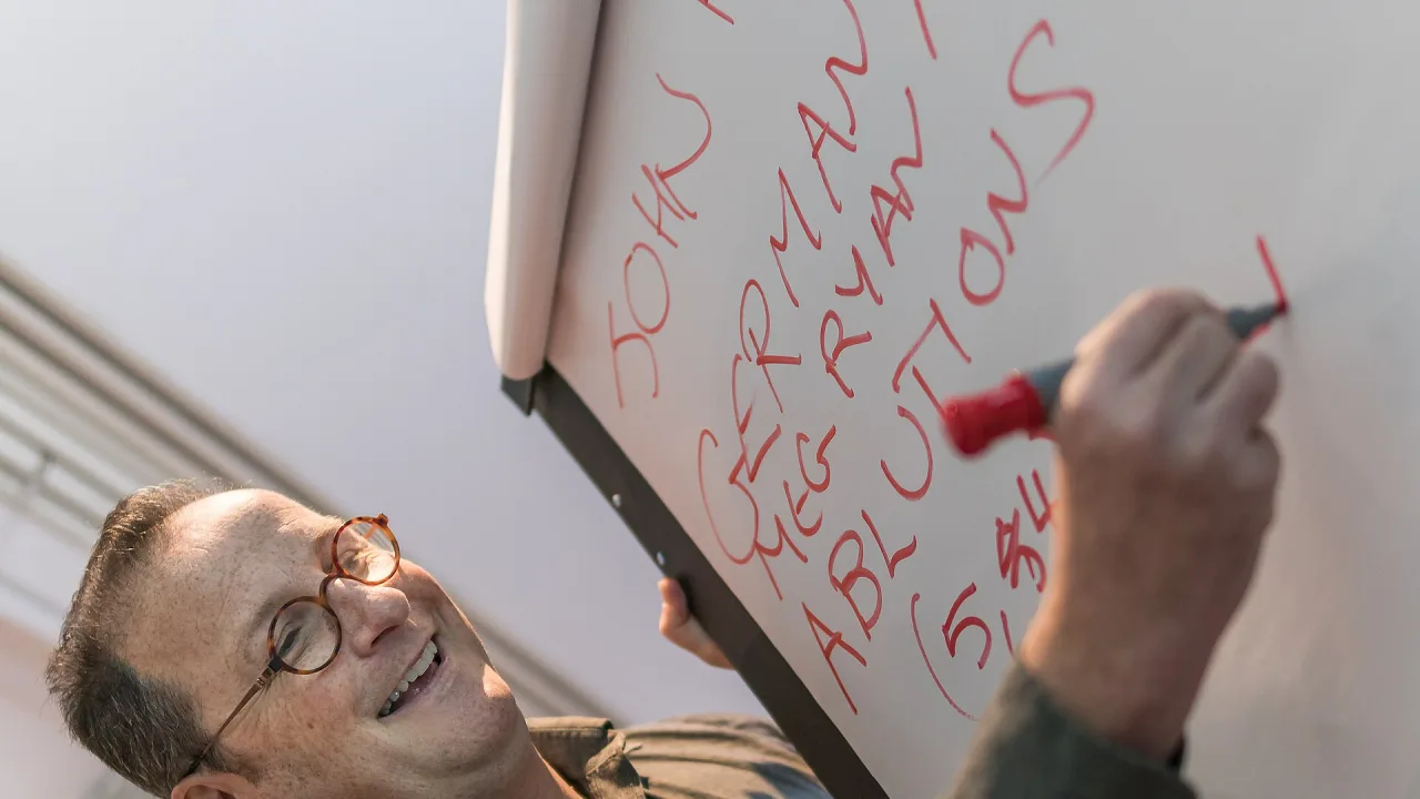 John Halpern, the UK's No.1 crossword setter, writing cryptic crossword clues.