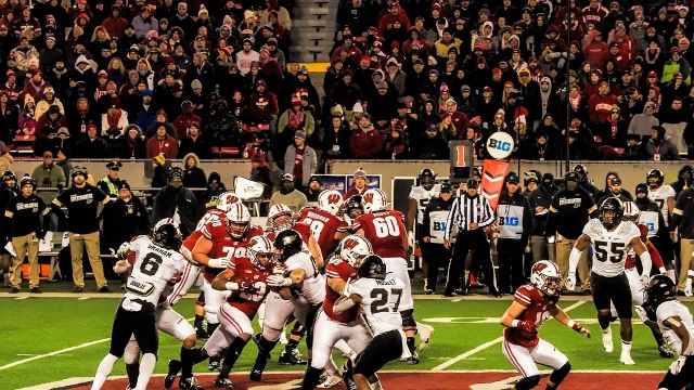 Jonathan Taylor rushing with the football