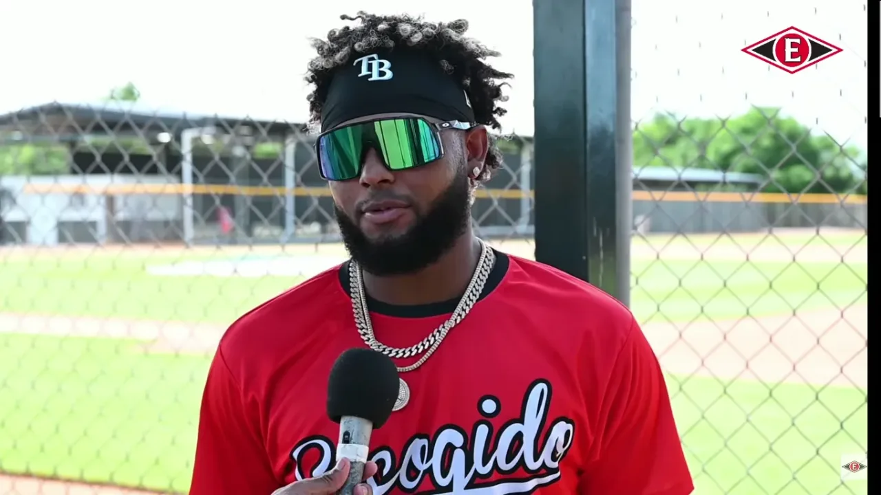 Junior Caminero of Leones del Escogido is interviewed in October 2023