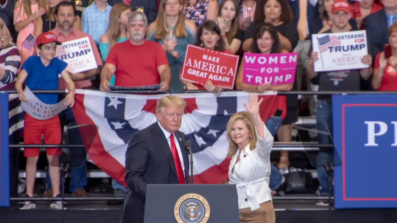 Marsha Blackburn and Donald Trump waving at Nashville Rally