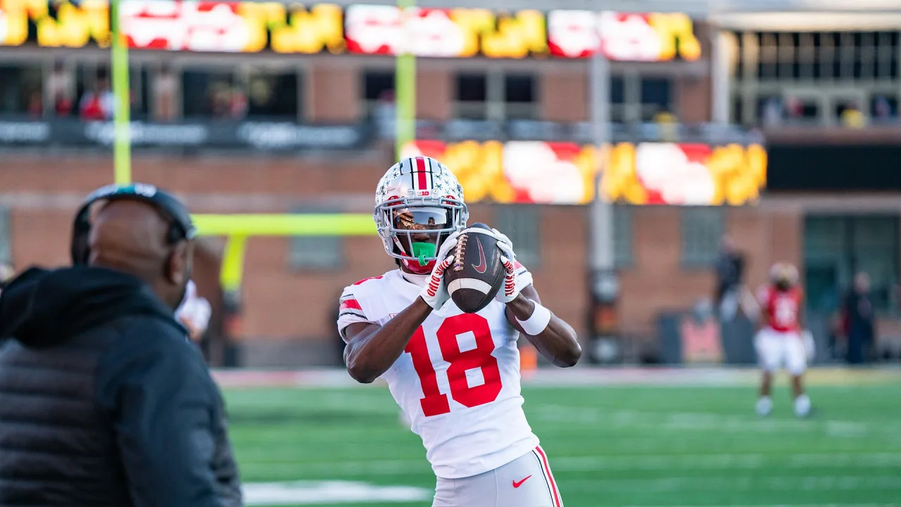 Marvin Harrison Jr catches a pass in warm ups prior to a 2022 game against Maryland.