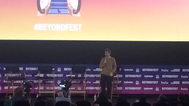 Nathan Fielder moderating the Mister America panel.