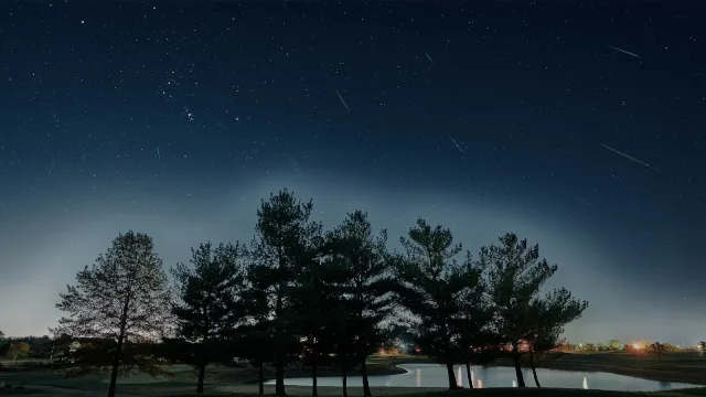 This is a composite of 19 selected frames from an overnight timelapse that captured the Orionid meteor shower.