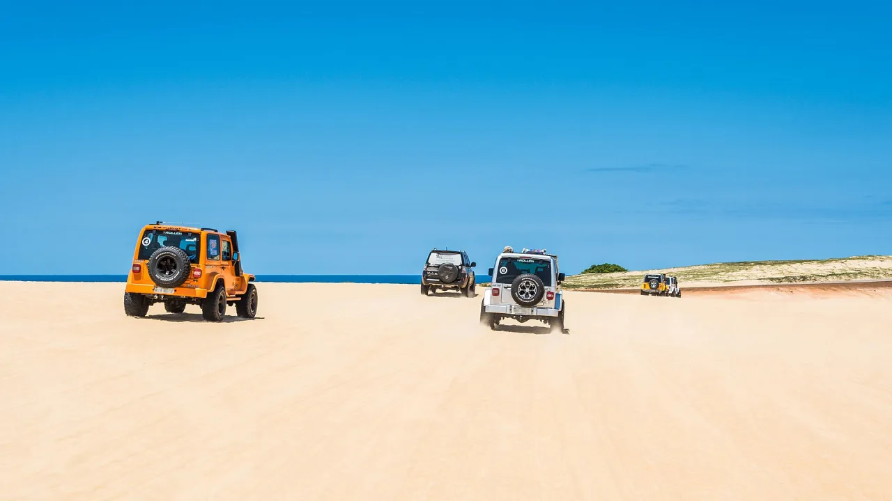 Jeeps riding at Parque das Dunas de Genipabu, RN, Brazil