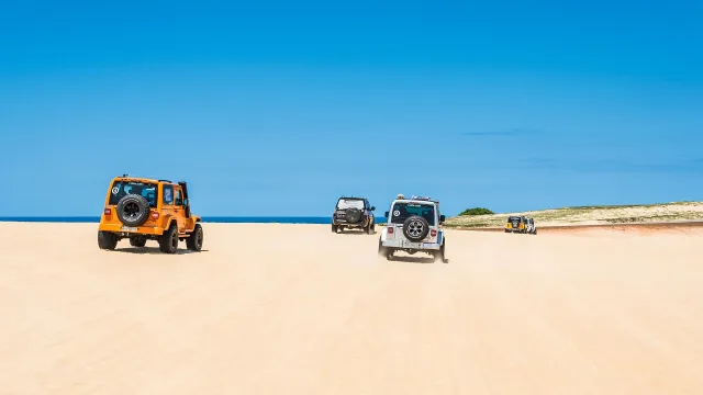 Jeeps riding at Parque das Dunas de Genipabu, RN, Brazil