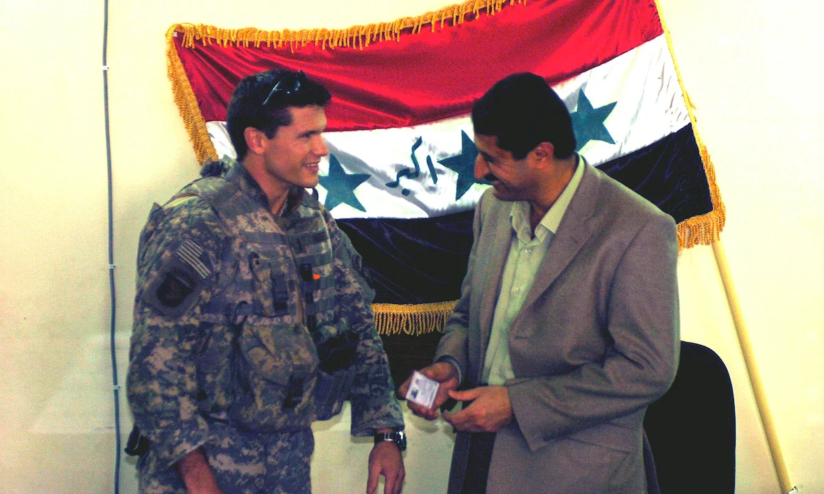 Pete Hegseth meeting with the mayor of Samarra, Iraq, Manmood Kalaf Ahmed, in 2005.