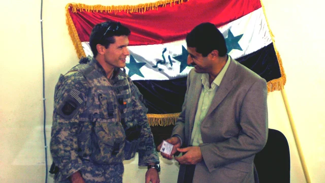 Pete Hegseth meeting with the mayor of Samarra, Iraq, Manmood Kalaf Ahmed, in 2005.