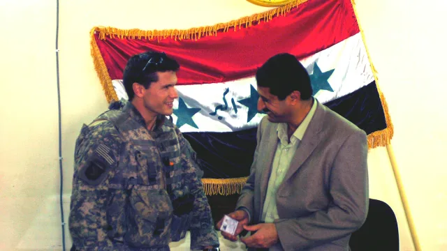 Pete Hegseth meeting with the mayor of Samarra, Iraq, Manmood Kalaf Ahmed, in 2005.