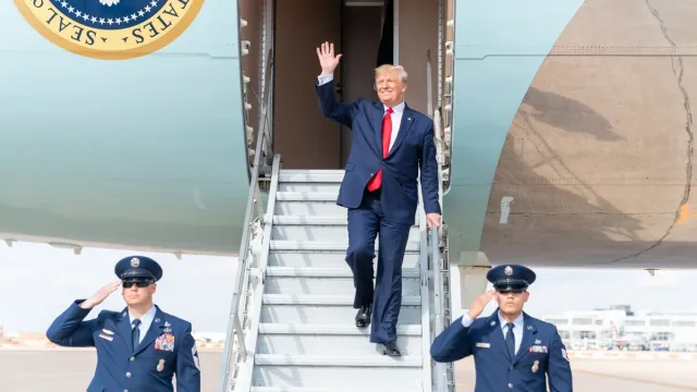 President Donald J. Trump disembarks Air Force One at Austin-Bergstrom International Airport in Austin, Texas Wednesday, Nov.