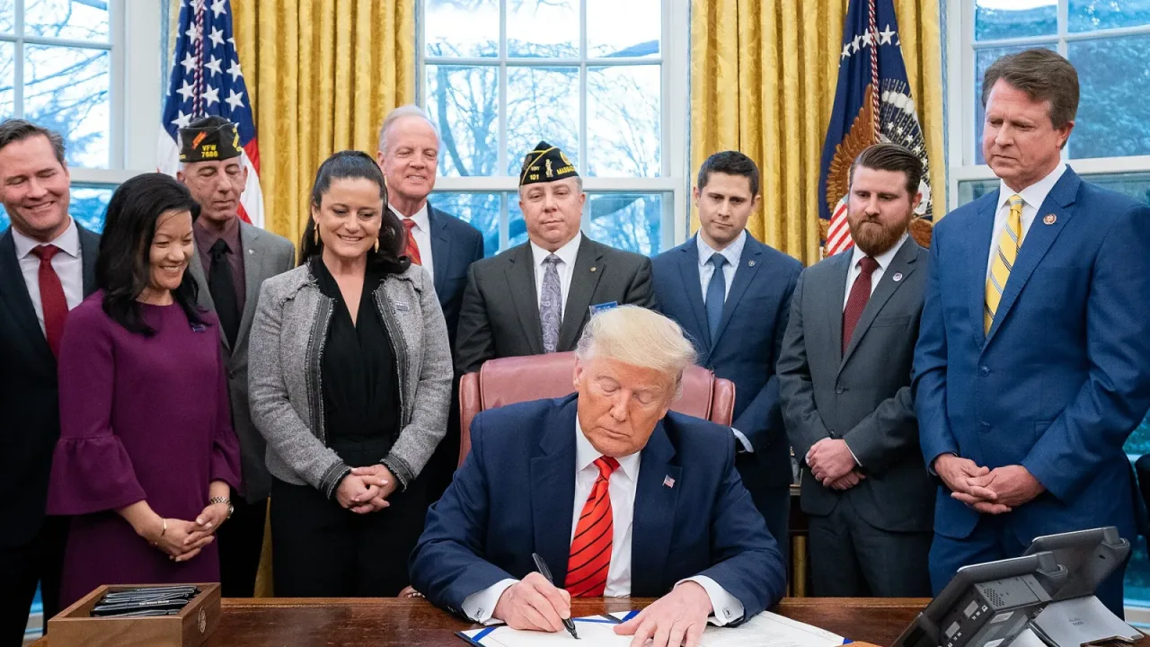 President Donald J. Trump signs S.153 , The Supporting Veterans in STEM Careers Act, in the Oval of the White House.