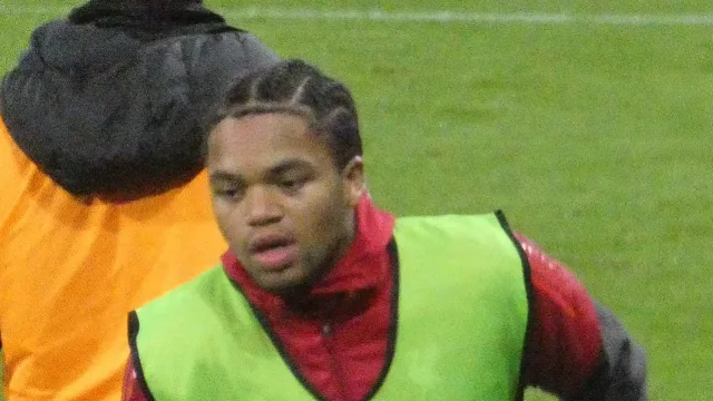 Rio Ngumoha warming up during the ongoing match between Fulham and Liverpool.