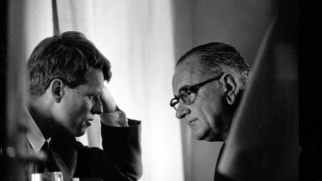President Lyndon B. Johnson and Robert F. Kennedy meeting at White House on October 14, 1964.