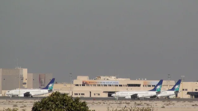Saudi Aramco airplanes parked in the general aviation terminal, King Fahd International Airport
