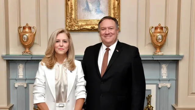Secretary Pompeo Poses for a Photo With Assistant Secretary McCarthy