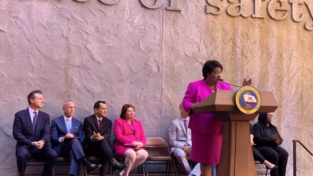 Shirley Weber speaking at the signing of AB392.