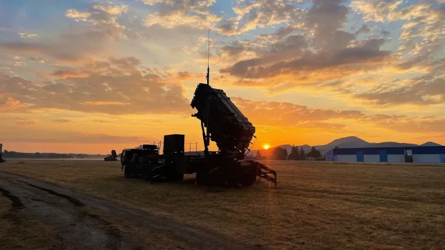 The sun rises over a 10th AAMDC Patriot missile launcher in Slovakia on July 27.