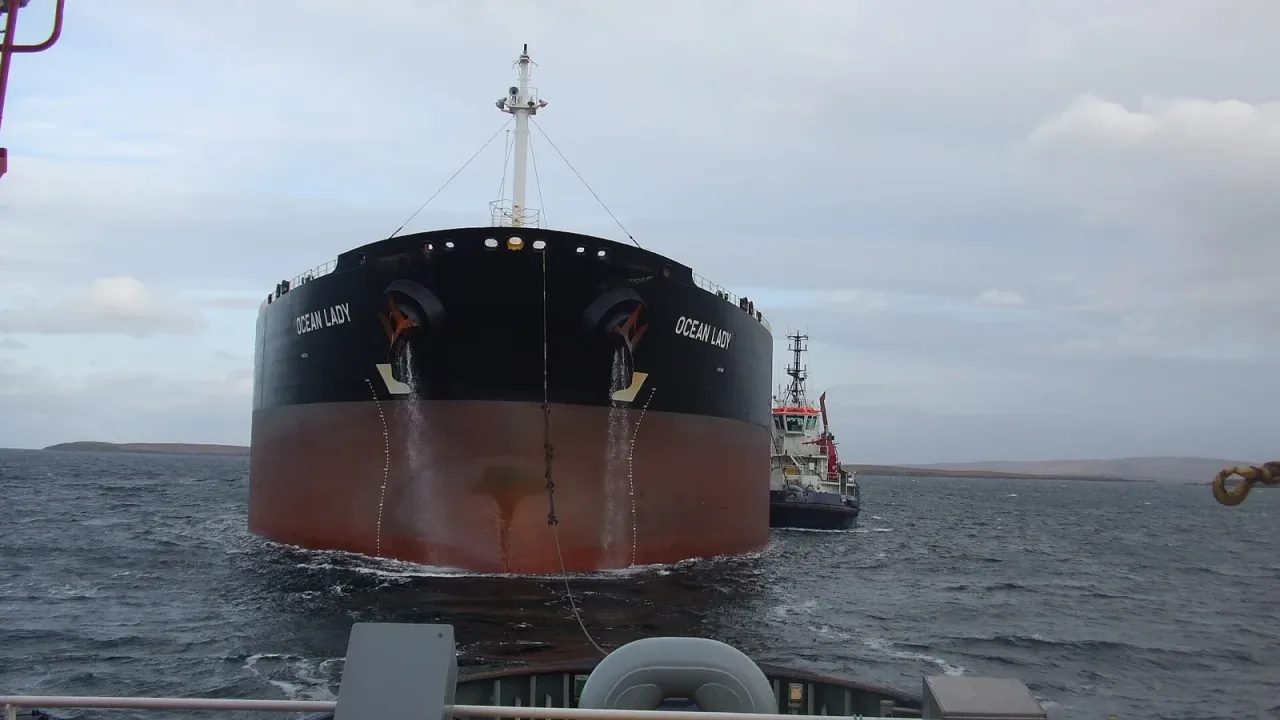 Tanker Ocean Lady being escorted by voith tractor tugs into Sullom Voe Oil Terminal