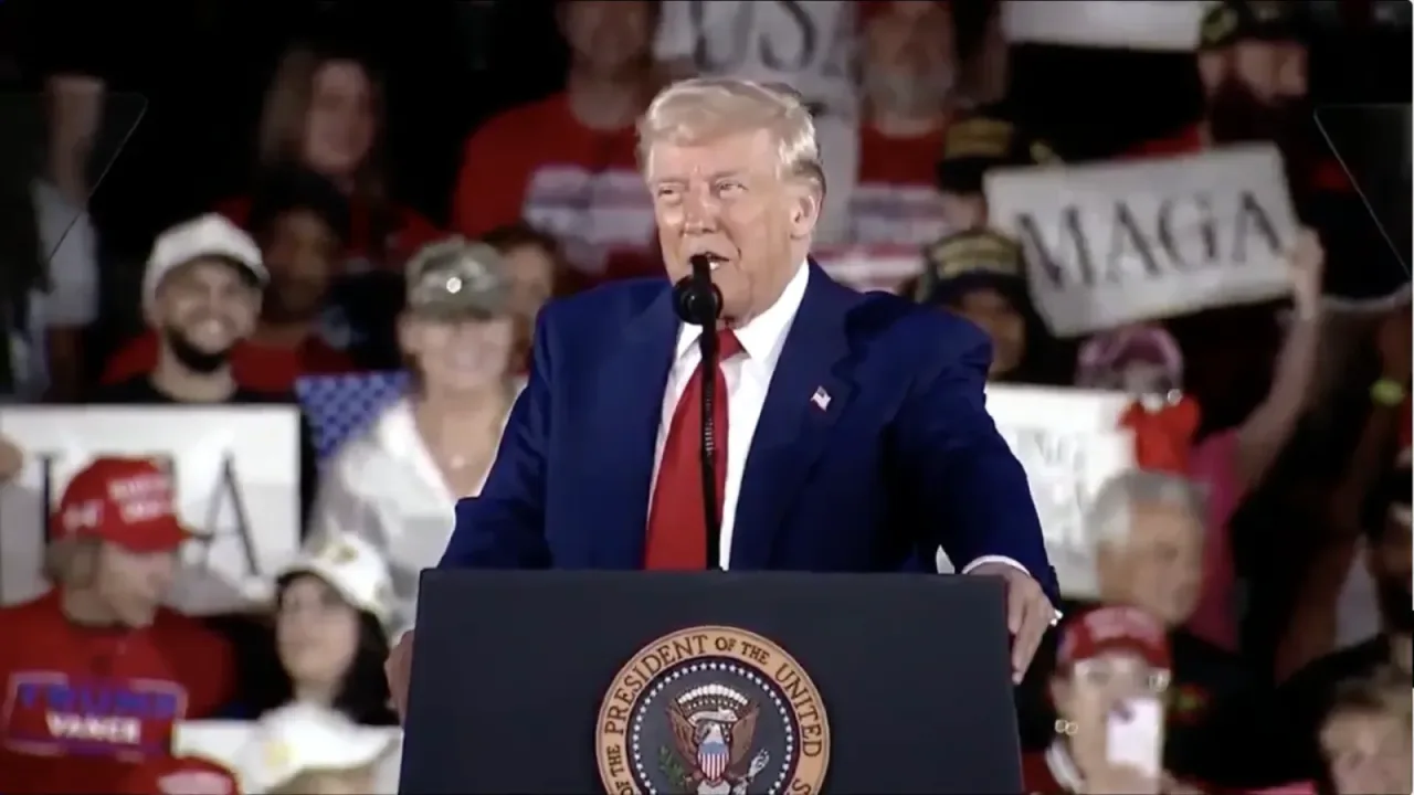 U.S. president Donald Trump speaks at a rally in Warren, Michigan, to commemorate the 100th day of his second presidency.