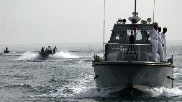 US Navy 060615-N-0411D-009 As part of a parade, one of the four former U.S. Coast Guard PT Boats leads a group of smaller Dj…