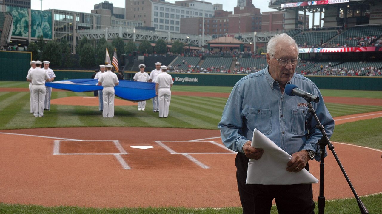 US Navy 060830-N-1805P-005 Major League Baseball Hall of Fame Inductee and World War II Navy veteran Bob Feller accepts a Cl…