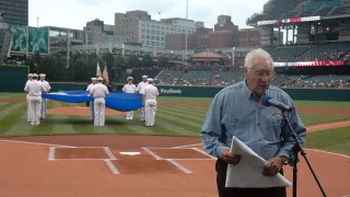 US Navy 060830-N-1805P-005 Major League Baseball Hall of Fame Inductee and World War II Navy veteran Bob Feller accepts a Cl…